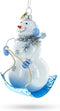Snowman Riding a Sled Blown Glass Christmas Ornament...