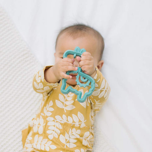 Itzy Ritzy Silicone Baby Teether – BPA-Free Infant Teether with Easy-to-Hold Design and Textured Back Side to Massage and Soothe Sore, Swollen Gum...