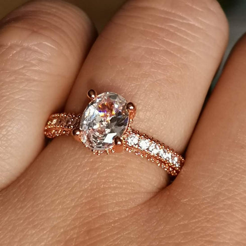 XIALV Rose Gold Plated Cubic Zirconia 2 Carats Oval Cut Ring Simulated Diamond CZ Wedding Engagement Ring for Women (US size 7)...