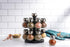 Olde Thompson Since 1944 Orbit Rotating Rack, 16 Refillable Spice Jars, Labeled Shaker Tops, 45, Black, Clear...