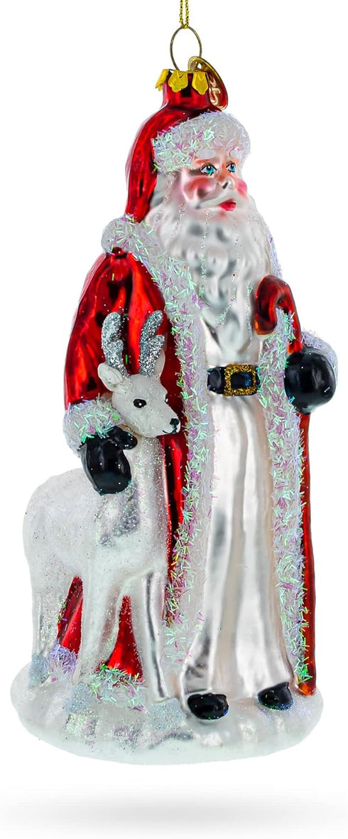 Santa Guided by White Reindeer Glass Christmas Ornament...