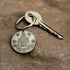 Shire Post Mint Golden Boxing of The Final Empire Keyring...