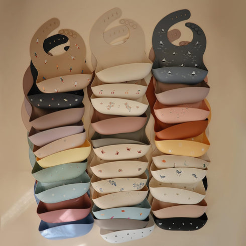 mushie Silicone Baby Bib | Adjustable Fit Waterproof Bibs (Powder Pink Confetti)...