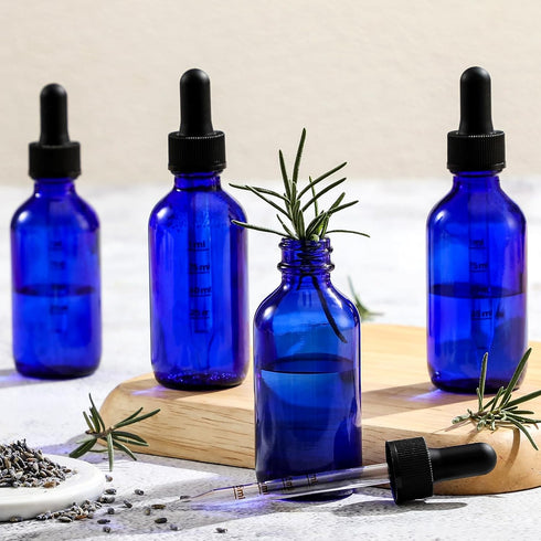 4 Pack 2 oz Glass Dropper Bottles with Measured Dropper - 60ml Dark Blue Tincture Bottles with Graduated Calibrated Glass Eye Droppers (1ml) for E...