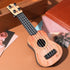 Toddmomy Kids Ukulele Toys Plastic Ukulele Guitar Musical Toy Classical Ukulele Guitar Musical Instrument Educational Toy for Beginner?Light Brown...