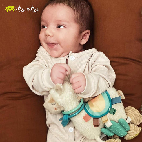 Itzy Ritzy Link & Love Toy for Stroller or Car Seat; Features Textured Ribbons, Crinkle Sounds, Clinking Rings & Silicone Teether; Designed For Ag...