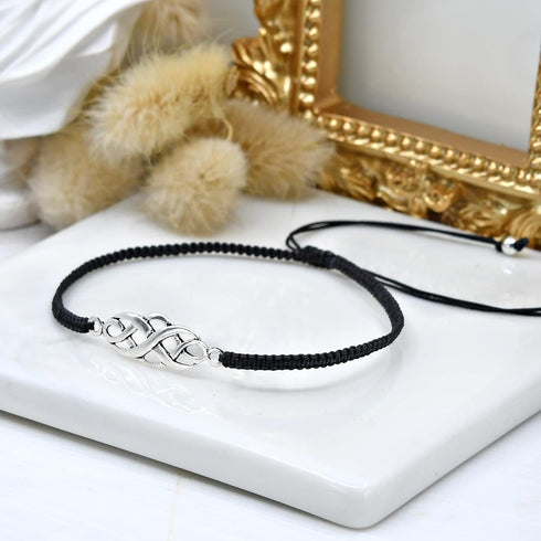AeraVida Celtic Infinity Knot Rope Sterling Silver Charm on Black Adjustable Bracelet...