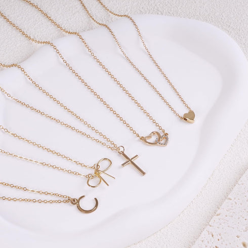 DF DUALFERV 5 Pcs Layered Gold Cross Necklaces for Women, 14K Gold Plated Cross Pendants for Women and Girls, Simple, Cute, Tiny Jewelry Gifts, Tr...