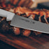 Dexter-Russell 10" Scalloped Cook’s Knife | S145-10SC-PCP | High Carbon Steel Blade with Slip-Resistant Grip | Sani-Safe Series | Made in USA...