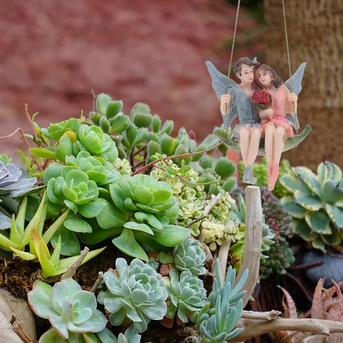 GANAZONO Couples Garden Flower Fairy Statue Garden Fairy Figurine Fairy Girl and Boy Sitting on Swing Sculpture for Garden Hanging Decor Ornament...