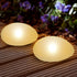SUNNYPARK Solar Garden Lights Outdoor Set of 4 Plastic Pebble Shape Decorative Rock Lights Waterproof - Warm White...