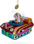 Astronaut in Space Vehicle Blown Glass Christmas Ornament...