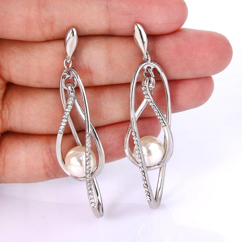 EVER FAITH Women's Austrian Crystal Simulated Pearl Twist Chandelier Teardrop Dangle Earrings Clear...