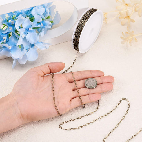 Craftdady 16.4 Feet Antique Bronze Paperclip Link Chain Brass Soldered Oval Cable Cross Chain 7x2.6mm with Spool for Jewelry Pendant Necklace Brac...