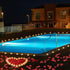 LANKER 500 PCS Red Artificial Rose Petals with 24 PCS Flickering Amber Yellow Flameless Tea Lights Candles for Valentine's Day and Romantic Occasi...
