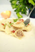 small pierogies, dumplings, uszka press/maker. Makes four small pierogies at once...