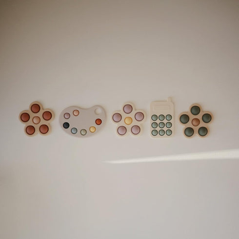 mushie Flower Press Toy (Soft Lilac/Daffodil/Ivory)...