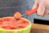 KitchenCraft Melon Baller Fruit Scoop, Soft Grip Easy to Clean Stainless Steel Head Cuts, 17cm (6.7"), Red...