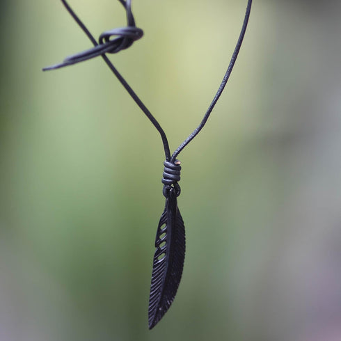NOVICA Artisan Handcrafted Crow Feather Necklace | Men's Leather Pendant Necklace | Cord Necklace with Carved Pendant | Leather Adjustable Necklac...