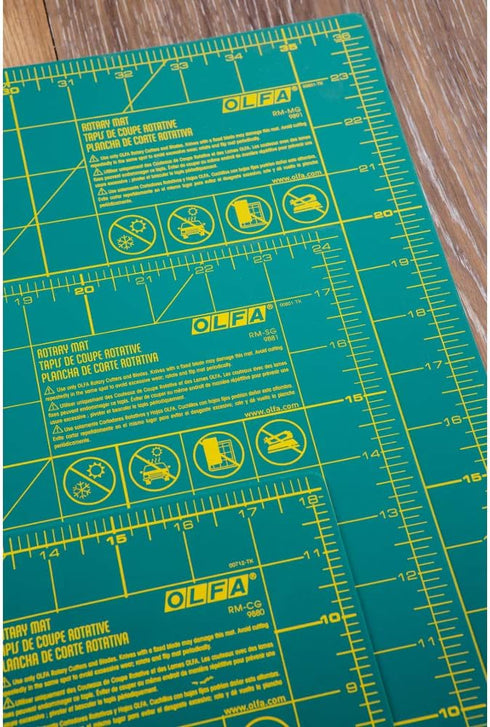 OLFA Gridded Cutting Mat 12"X18"...