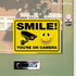 iSYFIX Smile You're on Camera Stickers for Business - 2 Pack 14x10 Inch - Self-Adhesive Vinyl, Laminated for UV Protection, Weather, Fade Resistan...