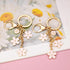 SELOVO Initial Keychain White/Pink Flower Charms for Key Cute Letter Keyring for Handbag Backpack...