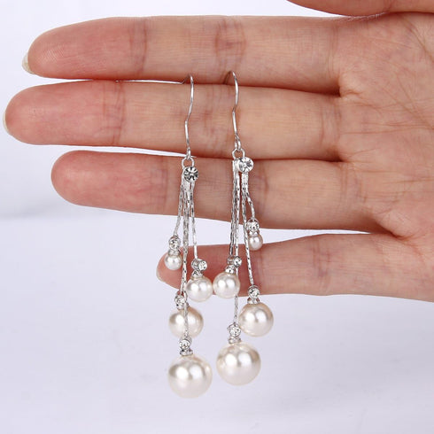 EleQueen Women's Silver-tone Crystal Simulated Pearl 4 Chain Bridal Long Dangle Hook Earrings Ivory Color...