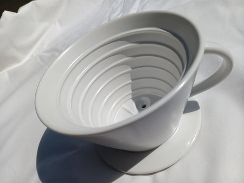 flat-bottom ceramic pour-over coffee dripper....