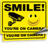 iSYFIX Smile You're on Camera Stickers for Business - 2 Pack 14x10 Inch - Self-Adhesive Vinyl, Laminated for UV Protection, Weather, Fade Resistan...