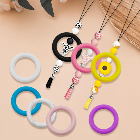 16pcs Silicone Beadable O Rings 65mm Silicone Bead Ring 16 Colors Silicone Focal Bead Round Silicone Loop with 2 Hole for DIY Keychain Car Bracele...
