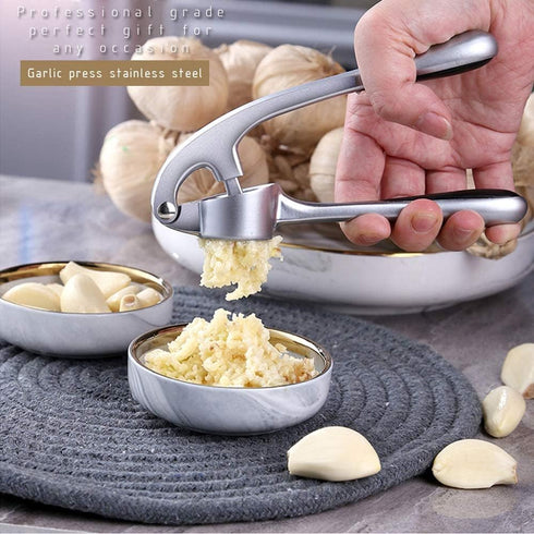 Garlic Press, Stainless Steel Garlic Press Tool with Cleaning Brush and Silicone Garlic Peeler 3 Pcs By Lechay...