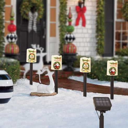 Solar 4PCS Christmas Decorative Lights Candle Lights Flickering Flameless LED Lights Outdoor Waterproof Xmas Decorations for Garden...