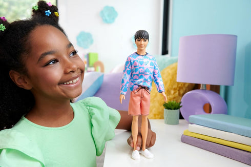 Barbie Fashionistas Ken Doll #219 with Slender Body Wearing a Removable Long-Sleeve Pink & Blue Patterned Shirt & Pink Shorts...