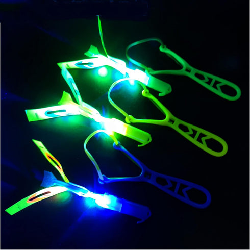 Amazing Led Flying Toys for Kids -12 PCS Light up Slingshot LED helicopter toy - Arrow Planes Glow in The Dark Party Favors for kids summer toys O...