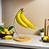 TIEYIPIN Banana Holder - Iron & Bamboo Fruit Stand for Bananas, Grapes & More - Keeps Fruits Fresh - Also Great for Headphones & Accessories - Eas...