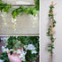 Mavee Artificial Wisteria Vine Garland Hanging Decor - 28.8ft Silk Flowers with Ivy Leaves (4x7.2ft) for Wedding, Home Floral Arrangements - White...