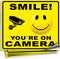 iSYFIX Smile You're On Camera Stickers for Home - 4 Pack 7x6 Inch - Decals for Inside the Window or Glass, UV, Weather, Scratch, Fade Resistance, ...