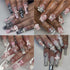 30 Pcs Nail Charms Pink Y2k Chrome Nail Art Rhinestone Charms 3D Cross Snake Saturn Shape with Rhinestones Planet Nail Gems Shiny Jewelry Nail Dec...
