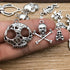 ALIMITOPIA Skull Head Charm Skeleton Bone Halloween DIY Jewelry Making Charm Pendant for Punk Necklace Bracelet Accessaries(32pcs;Silver Tone)...