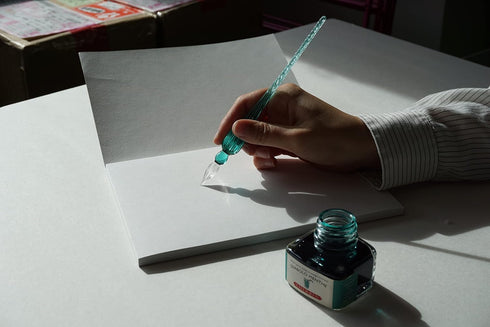 Herbin 28300T - Ecriture vénitienne/Venetian writing'' set comprising a twisted glass quill, sheet of parchment, bottle of sepia ink and instructi...