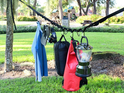 Campsite Storage Strap with 19 Separated Loops for Hanging Camping Equipment, Gear and Supplies | Includes Carabiner Hooks and Clothes Pins | Dura...