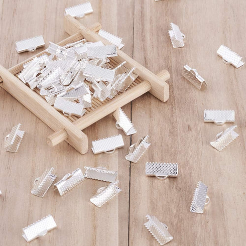 Craftdady Silver Ribbon Ends 50Pcs Bookmark Pinch Crimp Clamp Cord End Fastener Clasps with 1mm Loop for Leather Suede Jewelry Making 16x8mm...