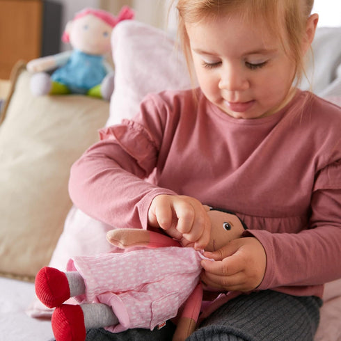 HABA Snug Up Doll Rumbi - 10" Soft Doll with Black Hair and Pink Overalls - Machine Washable for 18 Months and Up...