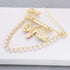 Gold Tone Crystal Pearl Chain Safety Pin Brooch Cardigan Hat Scarf Pin Brooch with Red Lip Charm...