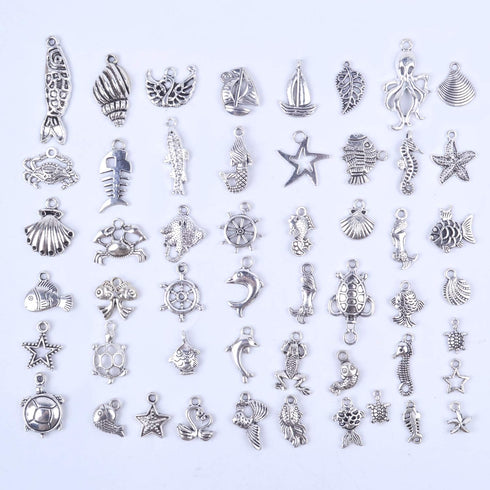 BronaGrand 100pcs Mixed Antique Silver DIY Ocean Fish & Sea Creatures Charms Pendants for Making Bracelet and Necklace...
