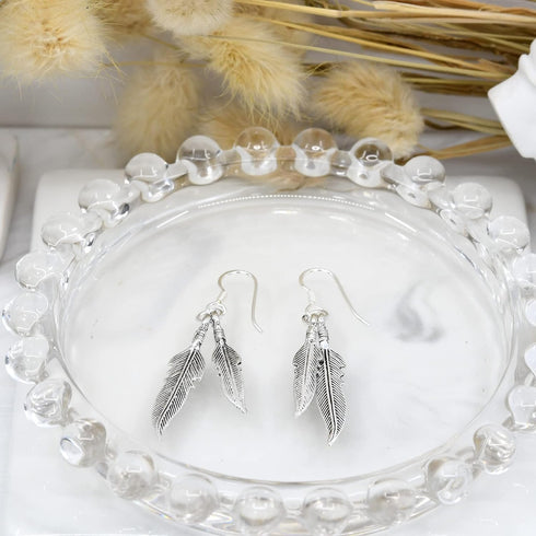 AeraVida Spectacular Double Feather .925 Sterling Silver Dangle Earrings | Luxurious and Elegant Feather Jewelry for a Timeless Look...