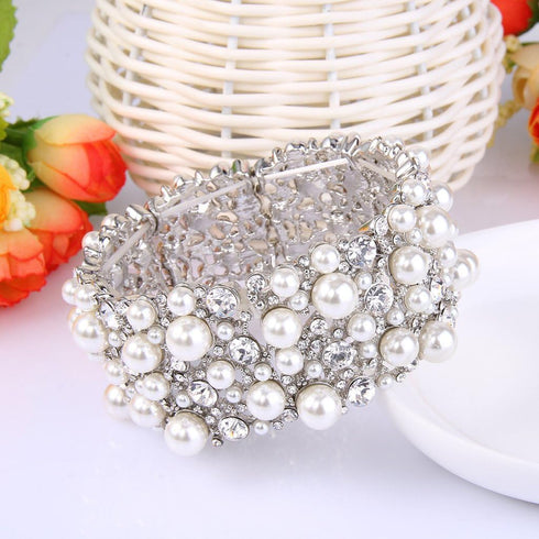 EVER FAITH Women's Crystal Simulated Pearl Stunning Bridal Wedding Hollow Elastic Stretch Bracelet...