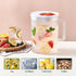 Plastic Water Pitcher with Lid and Handle - Durable Jug for Tea and Cold Juice - Heavy-Duty Clear Design 68oz/2L BPA-Free (White & Orange)...