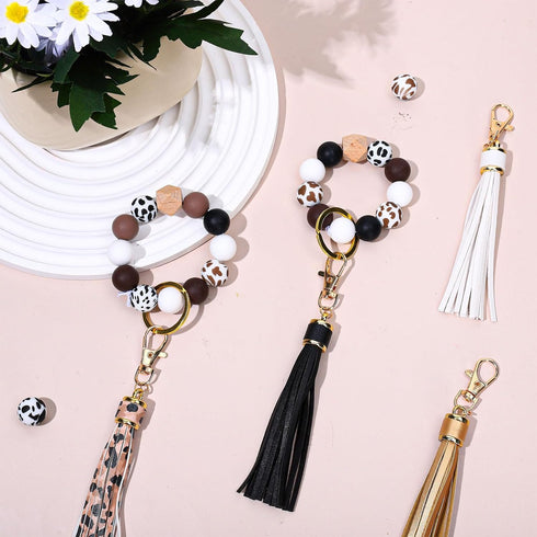 JarThenaAMCS 100Pcs Cow Print Silicone Beads Assorted Brown Black White Round Rubber Beads Keychain Making Kit with Elastic Rope Wood Beads Key Ri...