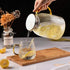 The Glass Water Pitcher with Lid and Handle, Glass Tea Pitcher, Carafe, Teapot and Jug for Coffee, Juice, Ice Water and Flower Tea Suitable for Yo...